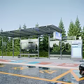 Modern Bus Station Surrounded by Green Trees With Glass Canopy Information Display And Parking Area