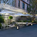 Outdoor Garden Landscape With White Lattice Pergola White Umbrellas Chairs Tables Green Bushes And Lighting