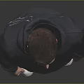 Man Wearing Dark Gray Hoodie With Brown Pants And White Shoes On Gray Background