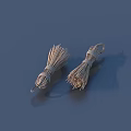 Two Bundled Metal Wire Brushes for Kitchen Cleaning on Blue Background