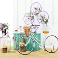 Decorative Scene Featuring Light Blue Bicycle Wicker Basket Purple Wheel Flowers And Green Cabinet