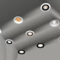 Modern Downlights and Spotlights Arranged on Gray Ceiling for Indoor Lighting