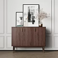 Modern Walnut Wood Entryway Cabinet Sideboard With Vase Framed Art On White Paneled Wall
