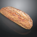 Freshly Baked Whole Grain Artisan Bread Loaf with Crusty Surface and Seeds