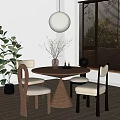 Round Wooden Dining Table With Modern Chairs Light Cushions Vase Dried Flowers And Pendant Light