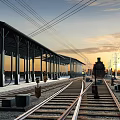 Black and Red Steam Train on Rail Tracks at Dusk Platform