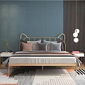 Modern Double Bed With Golden Headboard And Brown Gray Pillows In Blue Bedroom