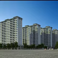 High Rise Residential Buildings Surrounded by Lush Green Trees in Organized Layout