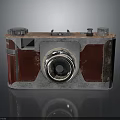 Vintage Electronic Camera Device With Retro Leather Cover And Classic Metal Body