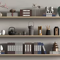 Stylish Books And Magazines Arranged On Shelves With Decorative Vases Teapots And Statues
