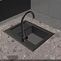 Black Kitchen Sink With Faucet On Stone Textured Countertop And White Cabinets