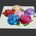 Colorful Decorative Ornament Set with Six Rose Shaped Ornaments Various Colors Green Leaves on White Square Base