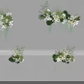 Elegant Floral Display With Hanging Tabletop Arrangements Greenery And White Flowers