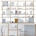 Modern White Wooden Display Shelves With Decorative Items Books Vases And Art Pieces
