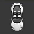 White Convertible Sports Car With Sleek Body Black Soft Top And Red Calipers