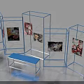 Blue Metal Frame Display Stands With Colorful Artworks And Blue Bench In Modern Exhibition Space