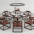 Round Dining Table Set With Wooden Frame Red Seats Hanging Chandelier And Tableware Decorations