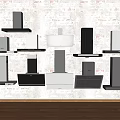 Various Modern Kitchen Range Hoods Displayed On Textured Wall 3d model