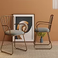 Stylish Leisure Chairs with Metal Frame Grey Cushions and Spiral Painting on Brown Wall