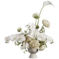 White Orchids and Cream Ranunculus in Ceramic Vase with Green Leaves and Flower Buds