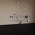 Modern Artistic Chandelier With Metallic Arms And Circular Light Shades In Contemporary Interior Space