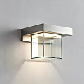 Modern Wall Lamp With Metal Frame And Glass Shade Mounted On Gray Wall