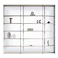 Modern Open Shelves Bookcase With White Frame And Decorative Items Including Vases Sculpture And Books