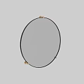 Round Wall Mounted Mirror With Black Frame And Gold Accents In Modern Interior Design