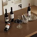 Wine Bottles And Glasses On Brown Wooden Table With Grapes Decanter And Decorative Paintings