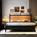 Double Bed with Black Frame and Orange Upholstered Headboard Wall Art Nightstand Lamp Flower Vase
