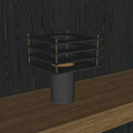 Modern Table Lamp With Layered Metal Structure Warm Light On Wooden Surface
