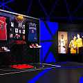 Modern Exhibition Space With Geometric Ceiling Blue Lighting And Red Displays