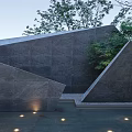 Modern Angular Stone Feature Wall With Surrounding Greenery And Embedded Lighting 3d model