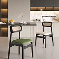 Modern Single Chair With Woven Backrest Black Frame And Green Upholstered Seat In Open Kitchen