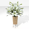 White Lilies In Wicker Vase With Metal Stand And Green Leaves