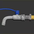 Household Water Tap With Blue Handle Silver Body And Yellow Connector