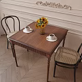 Wooden Dining Table And Chairs With Sunflower Vase White Cups On Decorative Wall Wooden Floor