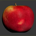 Fresh Ripe Red and Yellow Apple with Shiny Skin on Dark Background
