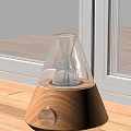 Modern Electronic Table Lamp With Transparent Glass Shade Wooden Base On Wooden Table By Window
