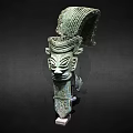 Ancient Bronze Sculpture With Intricate Facial Carving And Elaborate Headdress Design