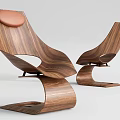 Two Modern Wooden Lounge Chairs With Curved Structure And Brown Cushion