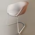 Modern Brown Leather Office Chair With Curved Metal Frame And Ergonomic Design