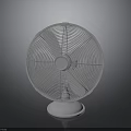 White Tabletop Electric Fan With Circular Blades Home Cooling Appliance