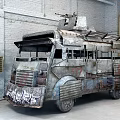 Rusty Armored Modified Car With Roof Weapon Metal Armor In Warehouse Brick Wall Setting