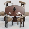 Round Dark Wood Dining Table Set with Six Beige Fabric Chairs and Vase