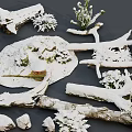 Natural Snow Covered Stones And Wood Branches With Small Plants And Green Moss