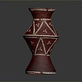 Red Decorative Vase With White Geometric Patterns And Ornate Design Details