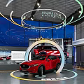 Red Mazda 240 TURBO Showcased in Modern Showroom with Innovative Safety Technology