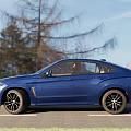 Blue Sporty SUV With Sleek Design And Orange Interior In Outdoor Road Setting