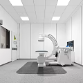 Hospital Outpatient Clinic Treatment Room With Medical Equipment Examination Table White Walls And Ceiling Lights